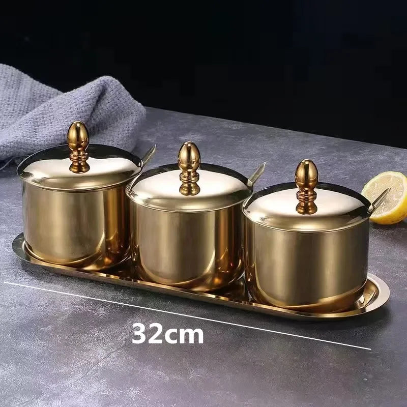 Gold MC THE BLACK DIAMOND 304 seasoning box with glass cap, spoon, and spice jar for salt, soy sauce, and flavoring storage.
