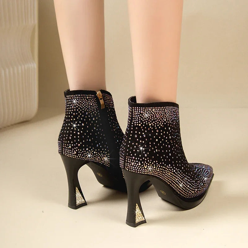 Women's short boots with thick square high heels from Mohammad Collection, featuring stylish design and black leather finish.