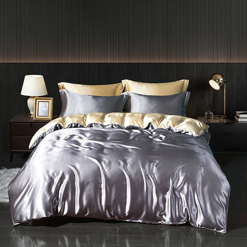 Luxury satin bedding set by MC THE BLACK DIAMOND with fitted sheet and duvet cover, featuring smooth, shiny fabric and elegant design.