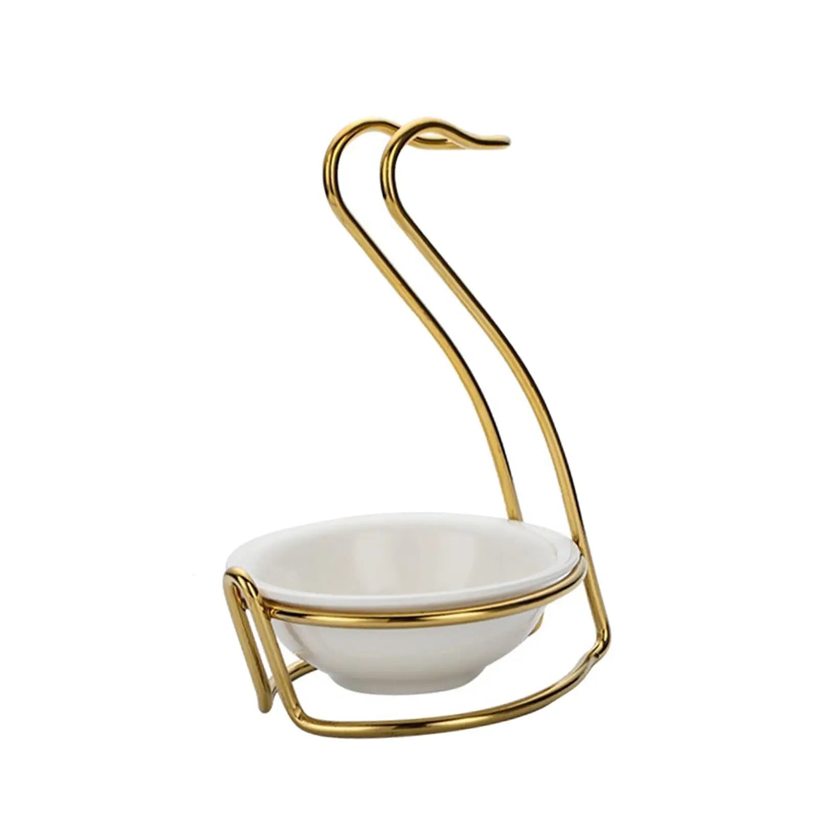 Black slotted spoon and portable whisk resting on a kitchen utensil holder, ideal for hotpot and household cooking.