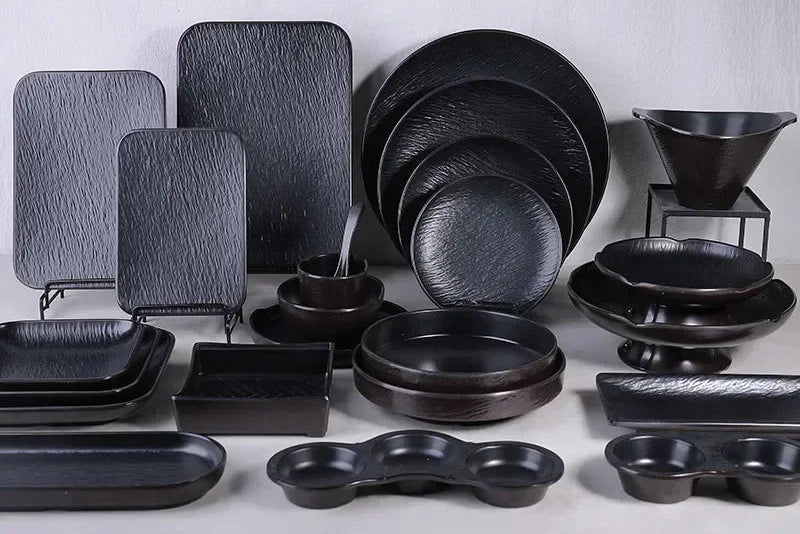 Black frosted melamine dinner plate from Mc The Black Diamonds, perfect for sushi, snacks, and fruit in kitchen or restaurant settings.