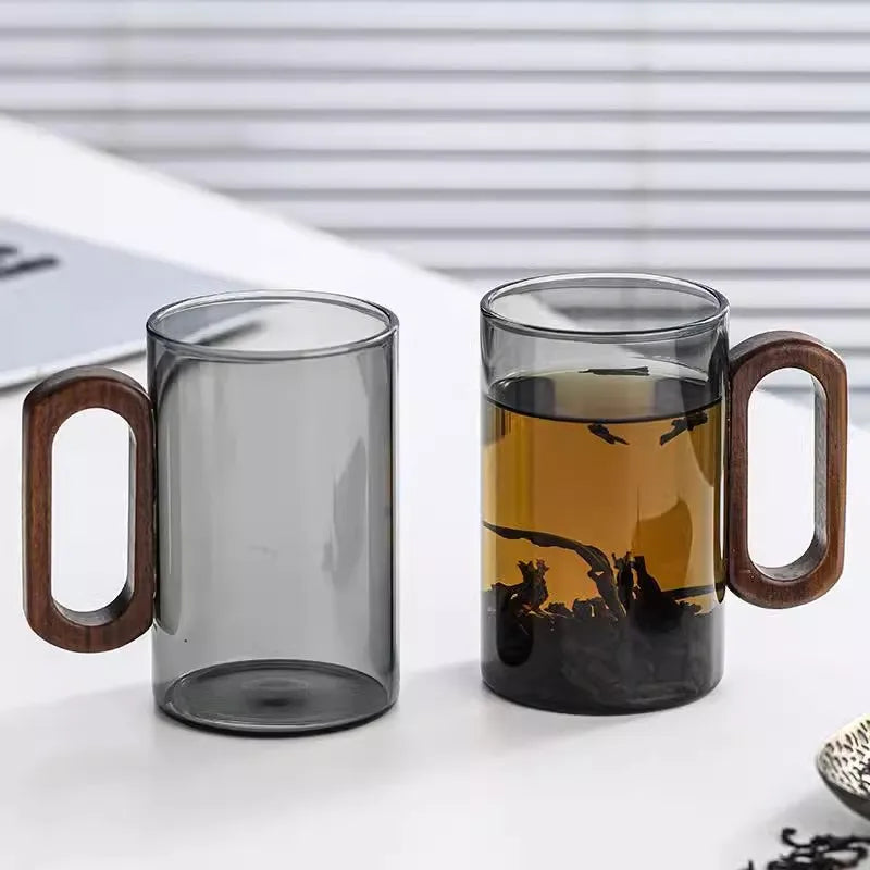 Glass mug with wooden handle from 𝕄𝕔 𝕋𝕙𝕖 𝔹𝕝𝕒𝕔𝕜 𝔻𝕚𝕒𝕞𝕠𝕟�