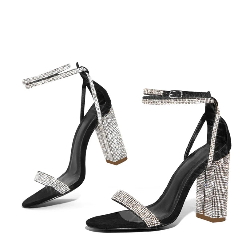 Liyke Fashion glitter rhinestone square high heels sandals from MC The Black Diamonds with sparkling embellishments and a block heel.