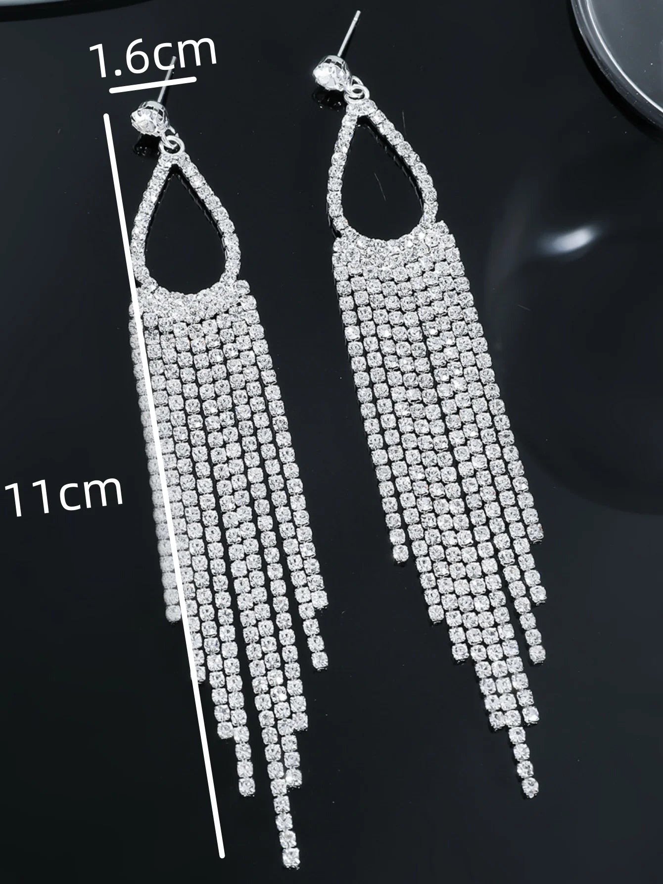 Pair of women's rhinestone tassel earrings by 𝕄𝕮 𝕋𝕙𝕖 𝔹𝕝𝕒𝕔𝕜 𝔻𝕚𝕒𝕞𝕠�