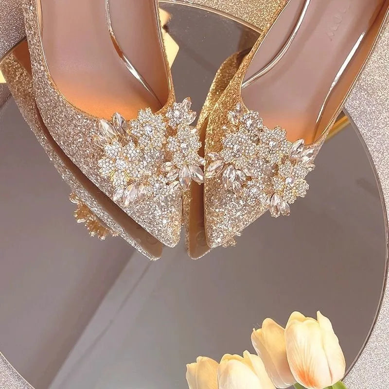 Women's high heel shoes by Mohammad Collection, elegant crystal pointed toe pumps with a retro shallow mouth design.