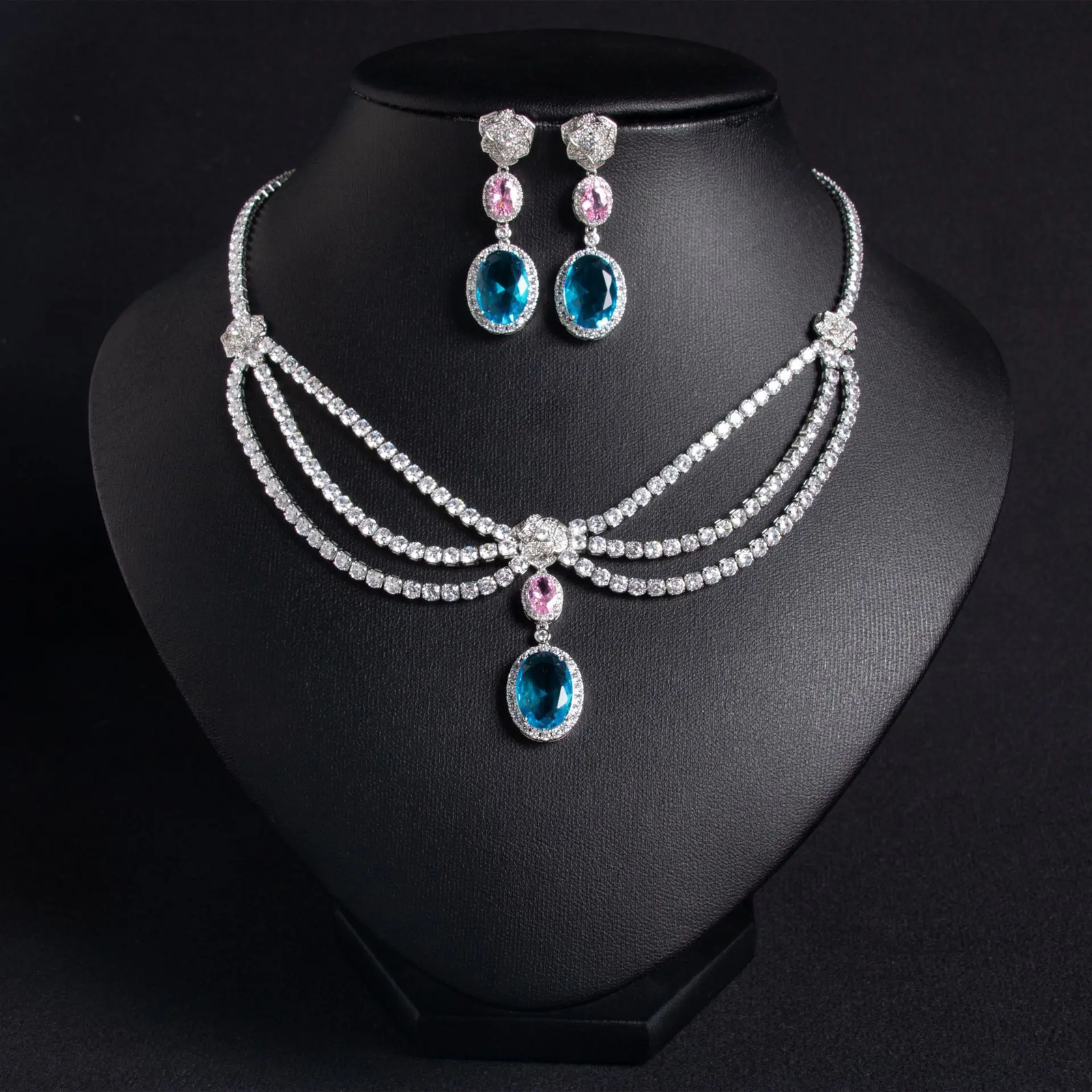 Elegant women's jewelry set with zircon flower tassel necklace and matching earrings, featuring green accents and intricate design.
