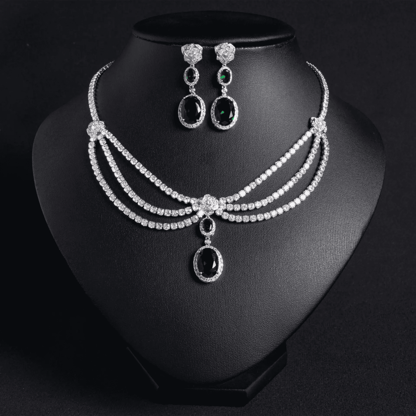 Elegant women's jewelry set with zircon flower tassel necklace and matching earrings, featuring green accents.