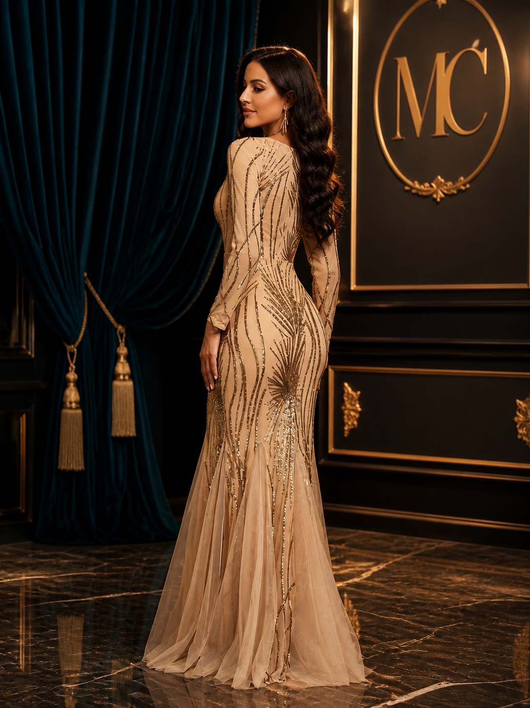 Elegant MC BRAND long sleeve sequin tulle top by MC THE BLACK DIAMOND, featuring shimmering sequins and delicate tulle fabric.