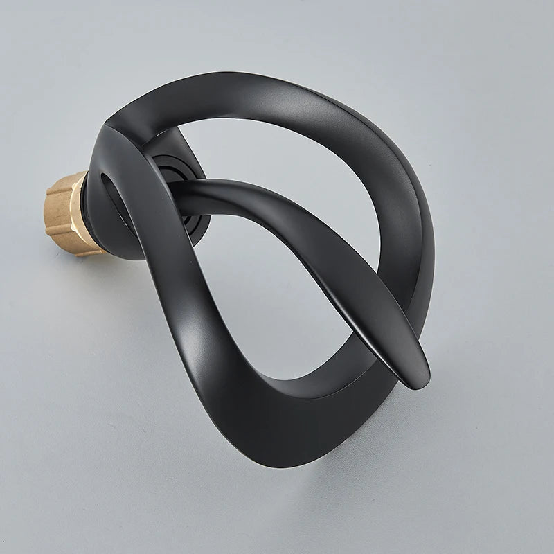 Solid brass waterfall bathroom sink faucet by MC THE BLACK DIAMOND with single handle for hot and cold water.