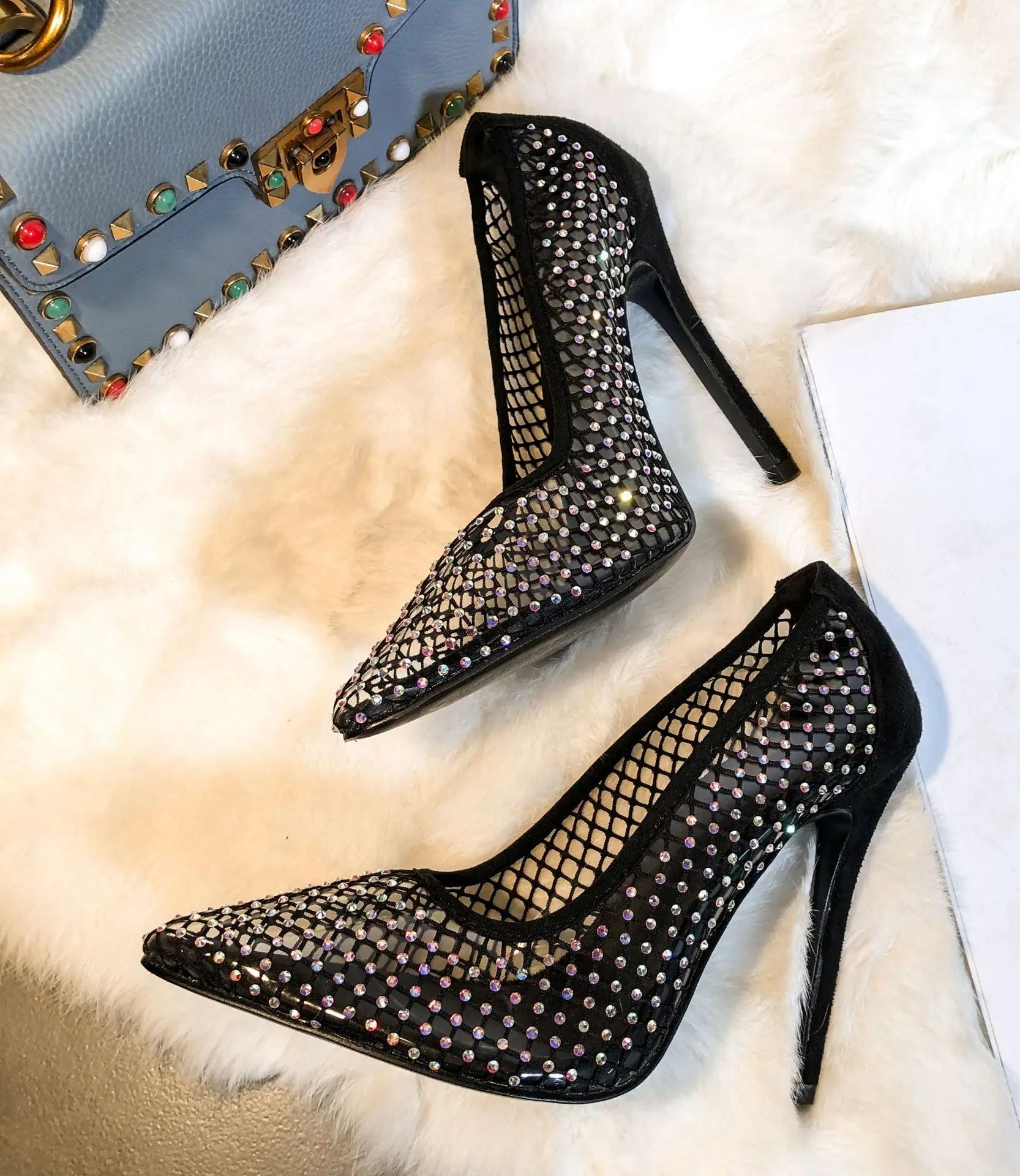 Colorful rhinestone women's pumps with glitter accents, breathable mesh, hollow design, thin heels, suitable for parties and weddings.