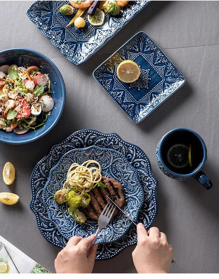 Blue retro relief ceramic dishes set for kitchen, featuring intricate patterns and classic design by 𝕄𝕔 𝕋𝕙𝕖 𝔹𝕝𝕒𝕔𝕜 𝔻𝕚𝕒�