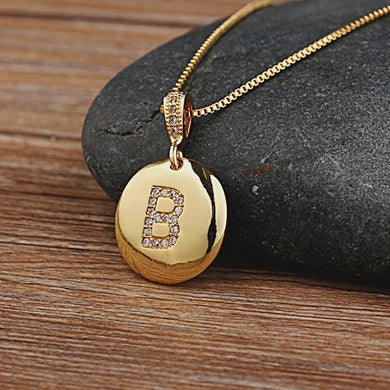 Copper initial letter necklace featuring CZ charm, designed for women and girls, from 𝕄𝕔 𝕋𝕙𝕖 𝔹𝕝𝕒𝕔𝕜 𝔻𝕚𝕒�