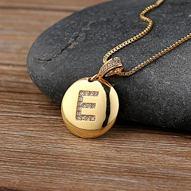 Nidin initial letter necklace with copper charm and CZ accents, featuring a 26 A-Z pendant, by 𝕄𝕔 𝕋𝕙𝕖 𝔹𝕝𝕒𝕔𝕜 𝔻�
