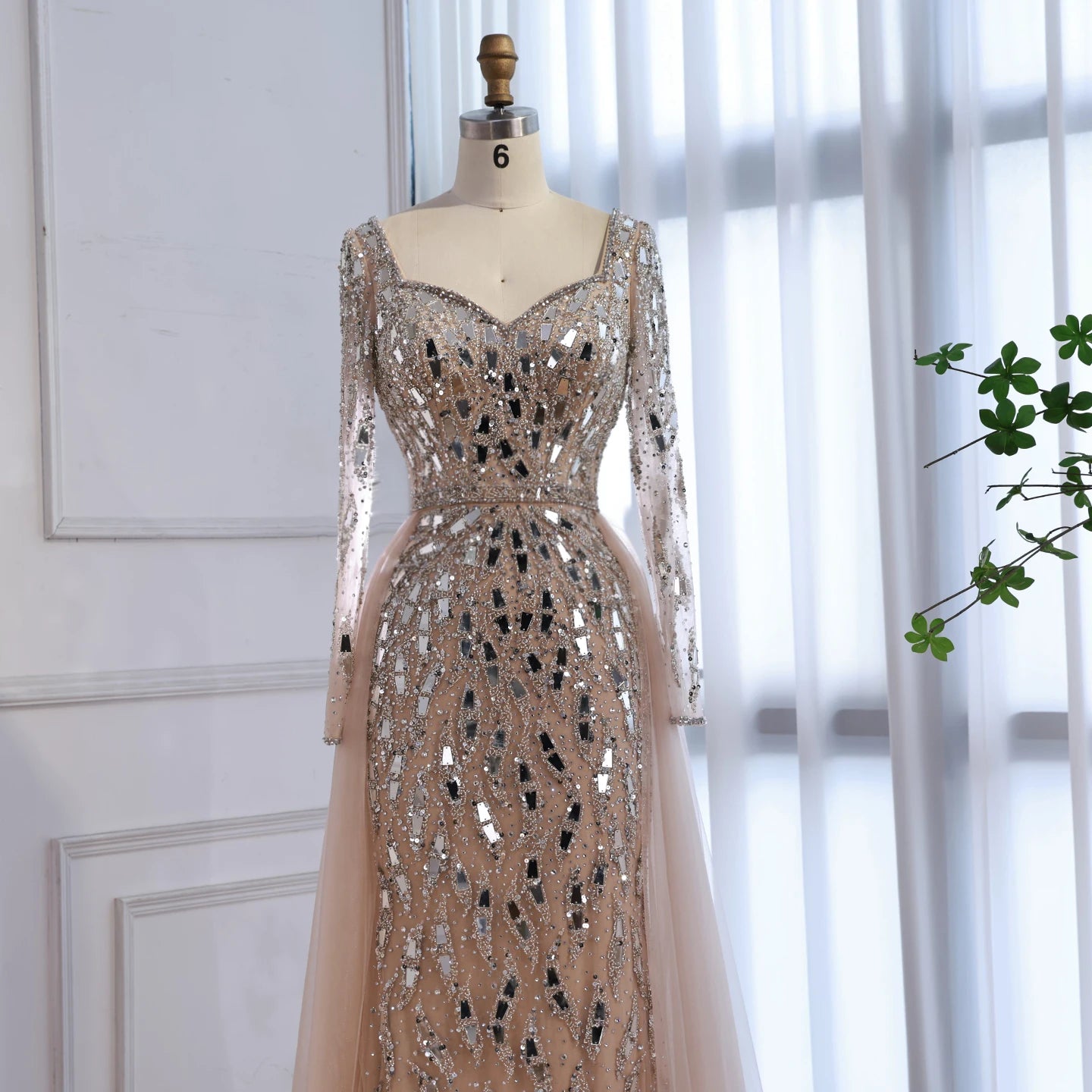Elegant MC Luxury Arabic dress by MC THE BLACK DIAMOND, featuring intricate embroidery and flowing fabric.