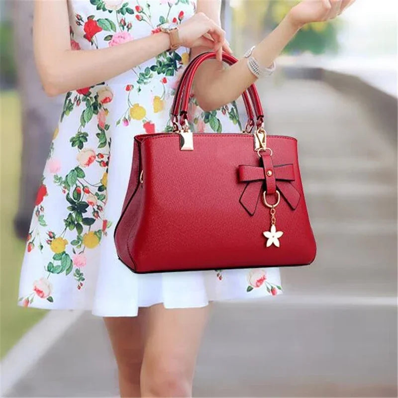 Women’s messenger bag by 𝕄𝕮 𝕋𝕙𝕖 𝔹𝕝𝕒𝕔𝕜 𝔻𝕚𝕒𝕞𝕠𝕟𝕕