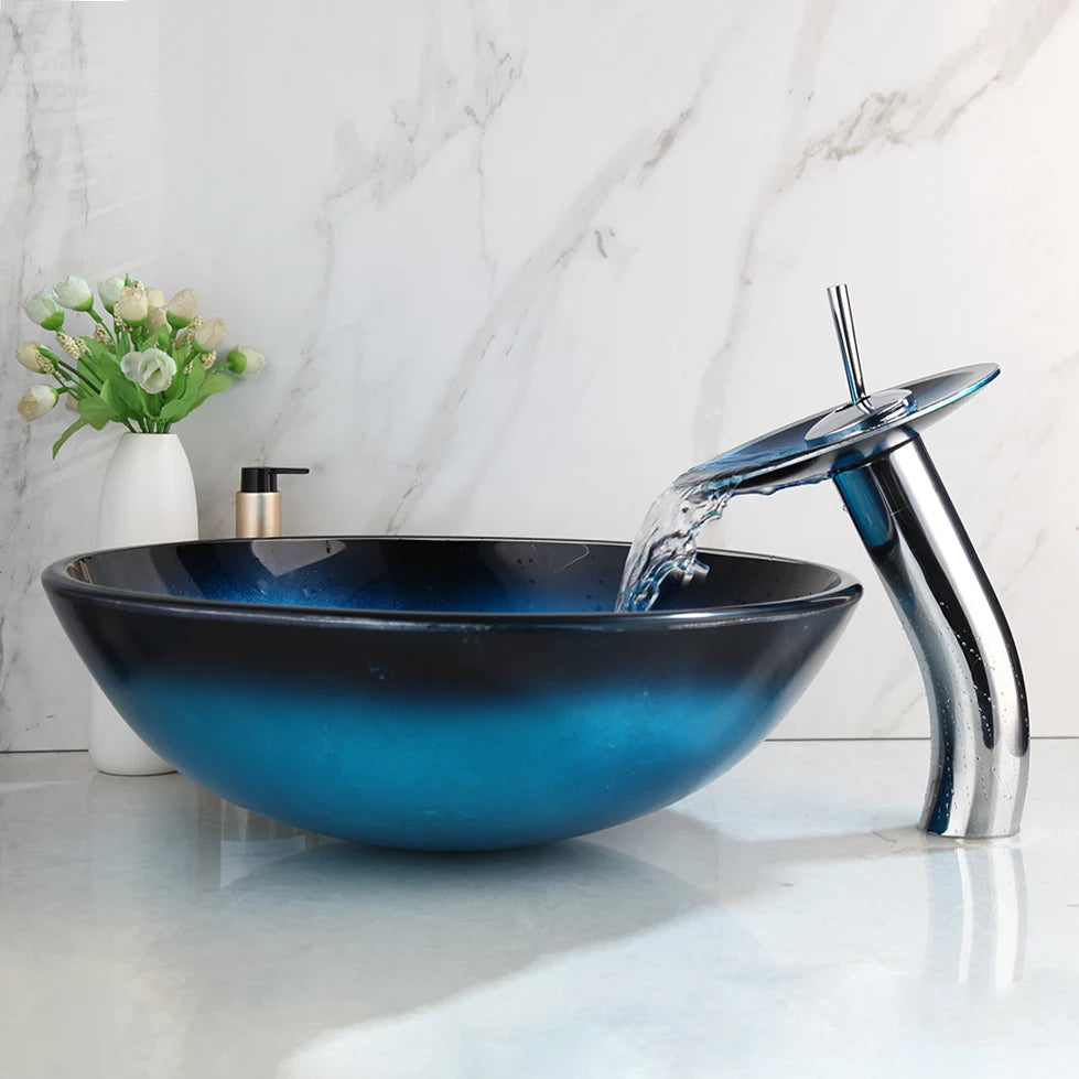 Black vessel sink with blue oval basin and ZAPPO tempered glass, paired with MC THE BLACK DIAMOND waterfall faucet tap.