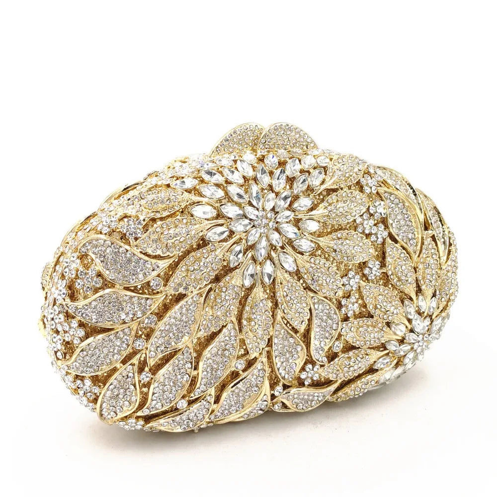 Gold metal leaves and white crystal evening clutch bag by MC THE BLACK DIAMOND, luxury women's wedding party hand purse with rhinestones.