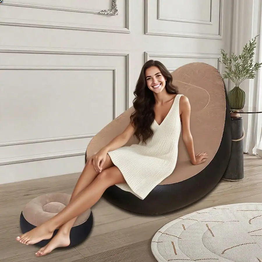 Flocked inflatable lazy sofa with footrest and foot pump from MC The Black Diamond, foldable chair for home, office, or outdoor use.