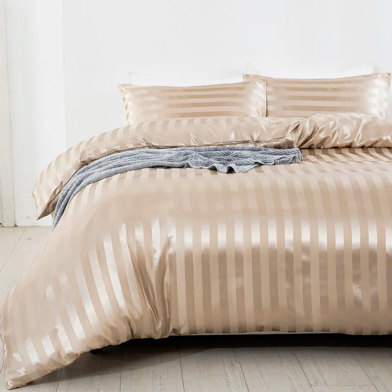 Luxury satin striped duvet cover set by MC The Black Diamonds, ivory white silky bedding with striped design on bedsheets.