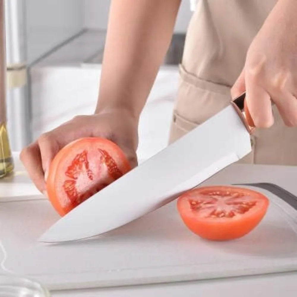 Cooking spatula spoon from Mc The Black Diamonds kitchenware set, featuring a black handle and stainless steel head for versatile use.