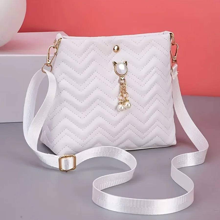 MC THE BLACK DIAMOND women's quilted crossbody handbag with cat pearl pendant, stylish shoulder purse for holiday or casual wear.