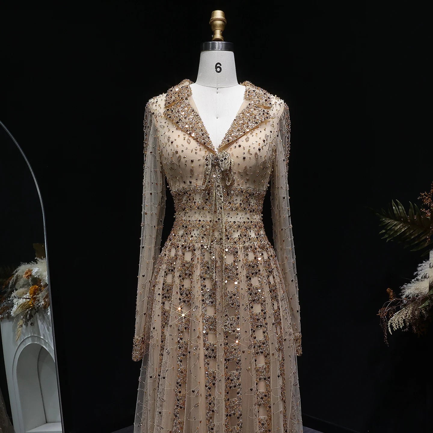 Elegant MC THE BLACK DIAMOND MC long sleeve formal evening dress with a sleek design and sophisticated fit.