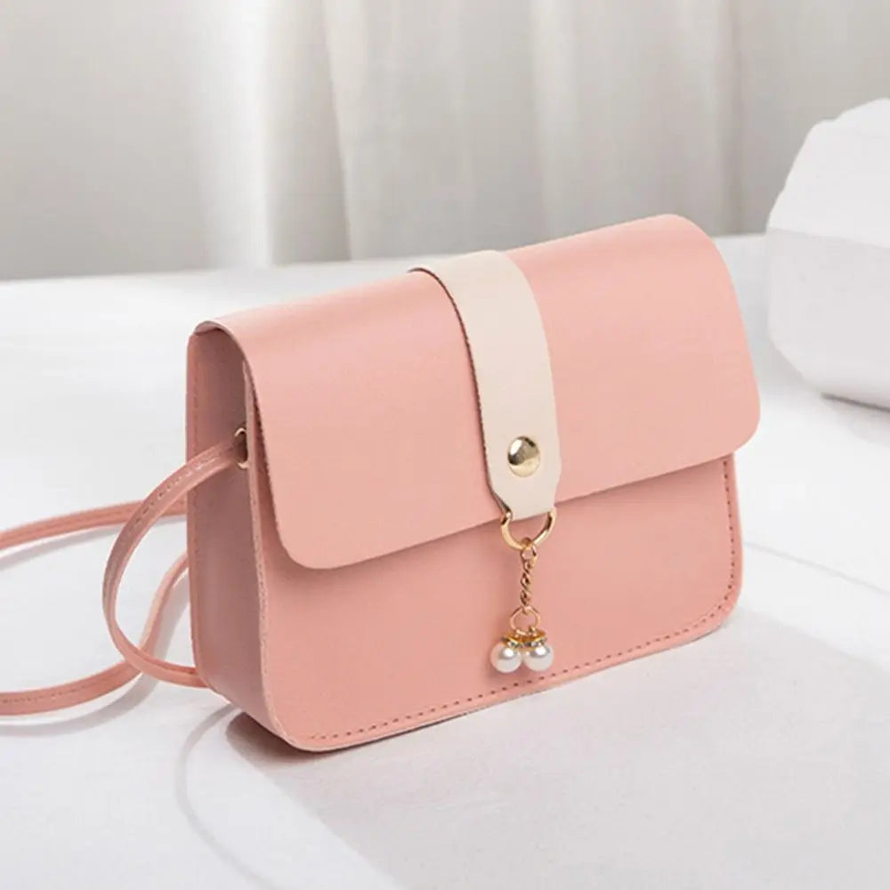 Fashion small square crossbody bag by MC THE BLACK DIAMOND, women's mini handbag with a sleek design for summer travel.