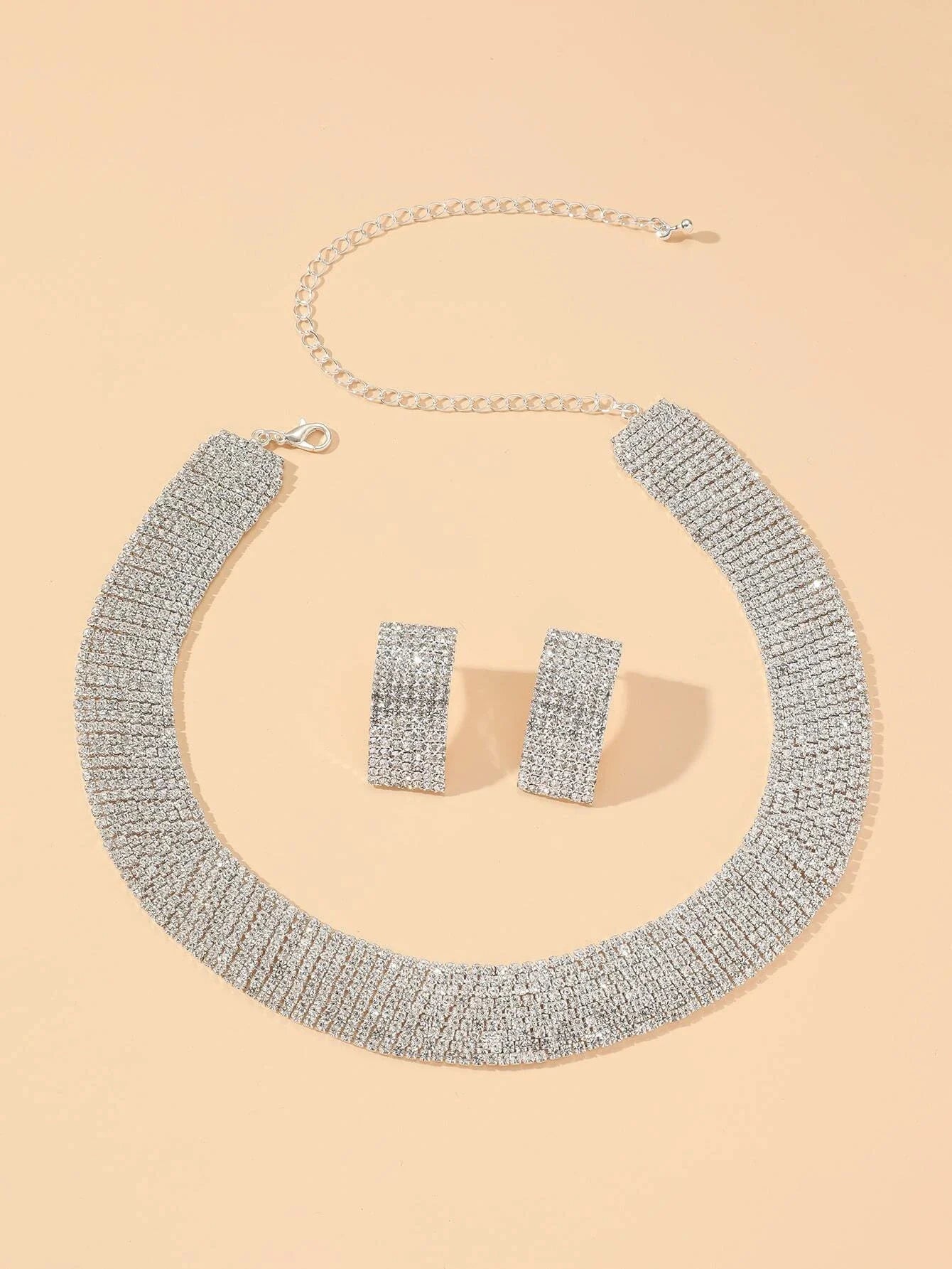 Three-piece women's jewelry set with rhinestone earrings and necklace from 𝕄𝕔 𝕋𝕙𝕖 𝔹𝕝𝕒𝕔𝕜 𝔻𝕚𝕒𝕞�