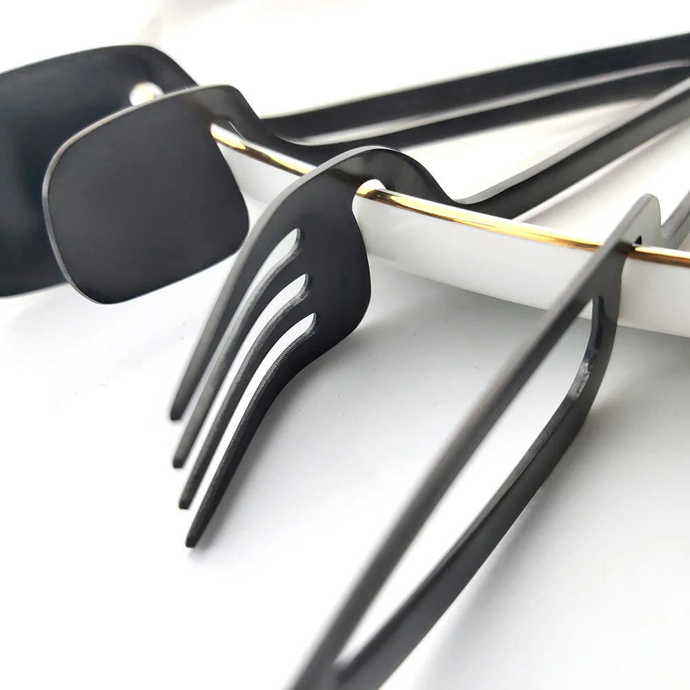 Black matte stainless steel cutlery set by 𝕄𝕔 𝕋𝕙𝕖 𝔹𝕝𝕒𝕔𝕜 𝔻𝕚𝕒𝕞𝕠𝕟