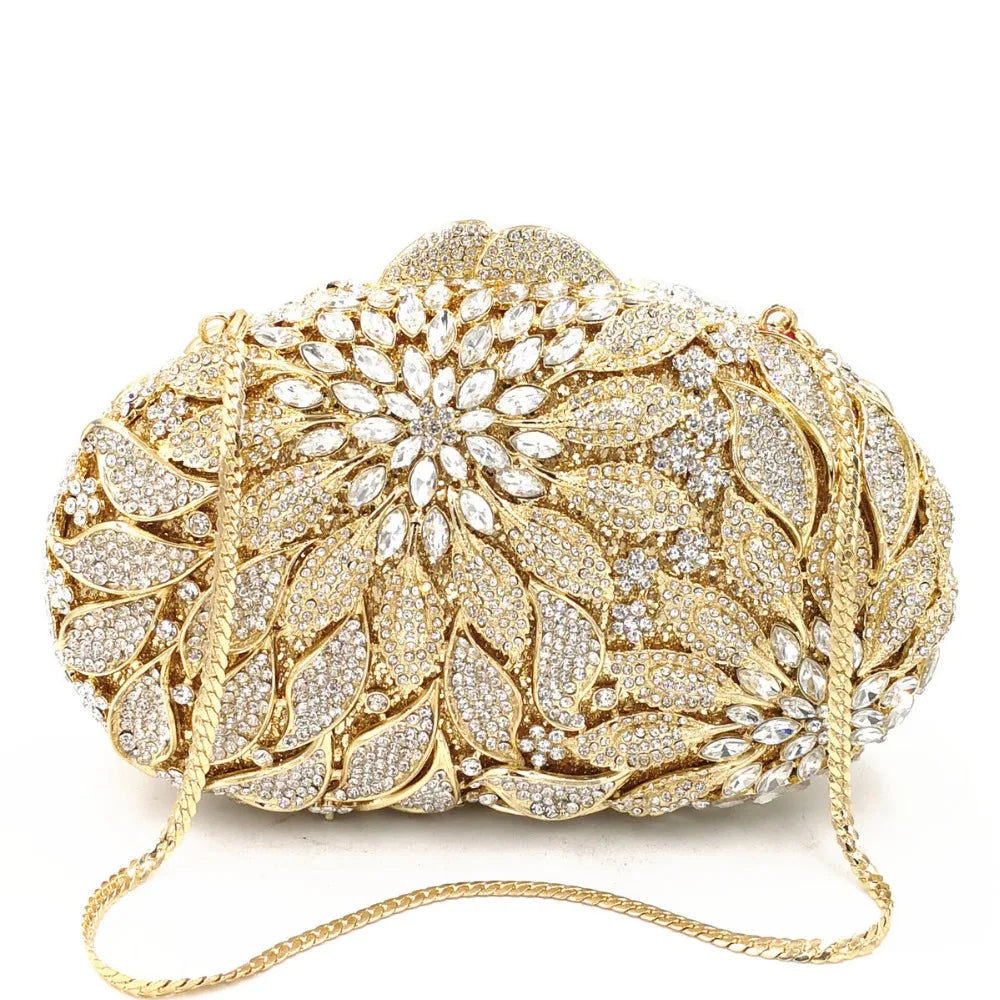 Gold metal leaf and white crystal evening clutch bag by MC THE BLACK DIAMOND, luxury mini heart-shaped purse for women’s wedding or party.