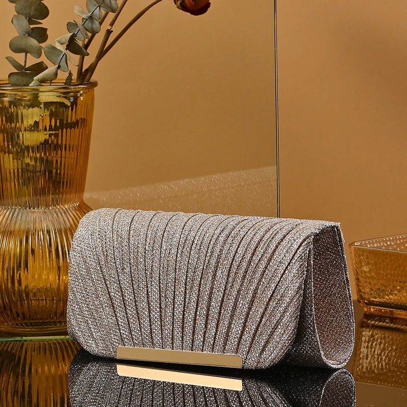 Silver bridal clutch bag by 𝕄𝕔 𝕋𝕙𝕖 𝔹𝕝𝕒𝕔𝕜 𝔻𝕚𝕒𝕞𝕠𝕟𝕕