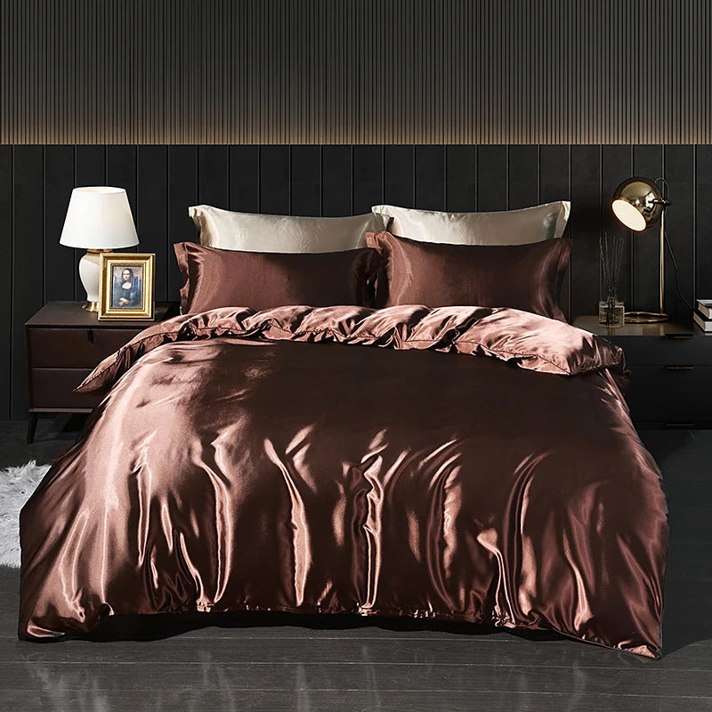 Luxury satin bedding set with fitted sheet and duvet cover from MC THE BLACK DIAMOND, featuring elegant, smooth fabric in a cozy bedroom.
