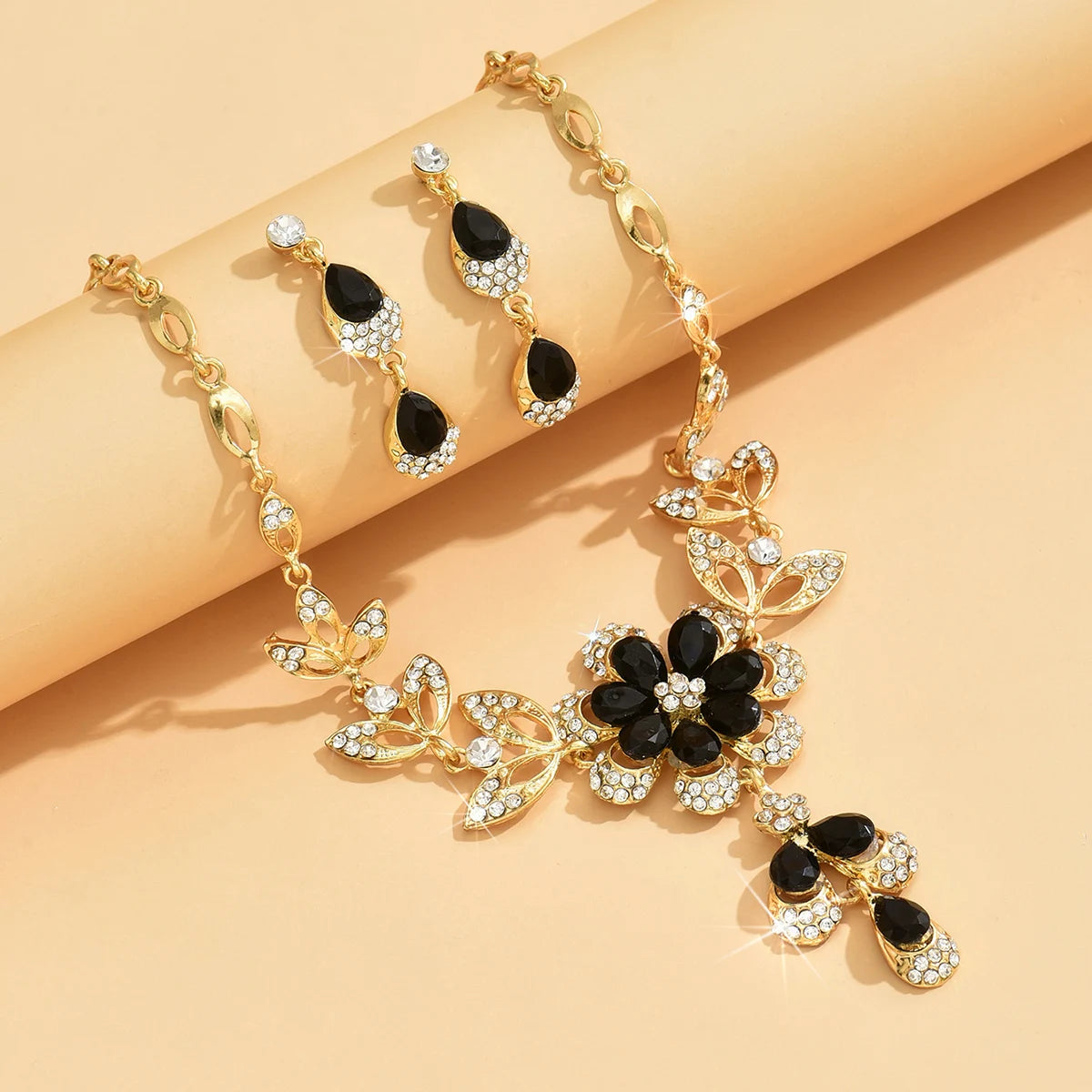 Three-piece women's fashion black and gold flower necklace set by 𝕄𝕔 𝕋𝕙𝕖 𝔹𝕝𝕒𝕔𝕜 𝔻𝕚𝕒𝕞𝕠