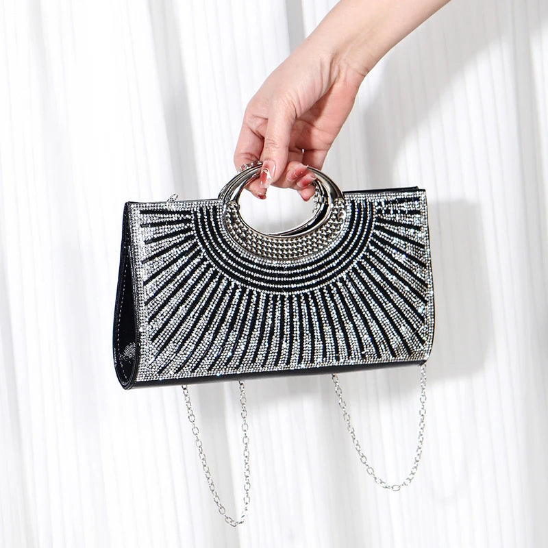 Elegant women's evening clutch bag with sparkling rhinestones and sequins, featuring a chain for wedding or party occasions.