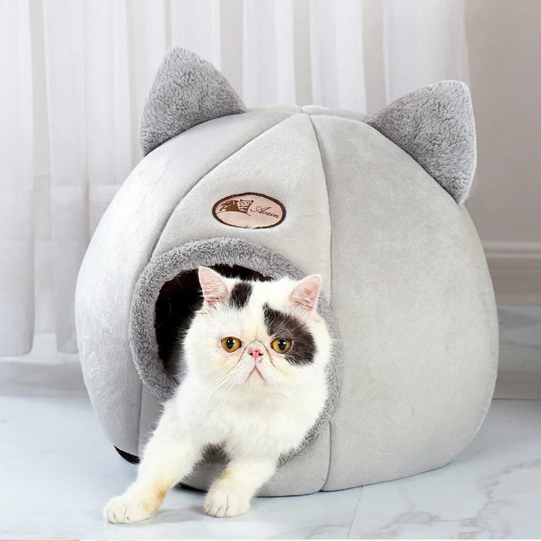 Soft pet cave bed by MC THE BLACK DIAMOND, designed for small to large cats, cozy hiding spot with plush interior.