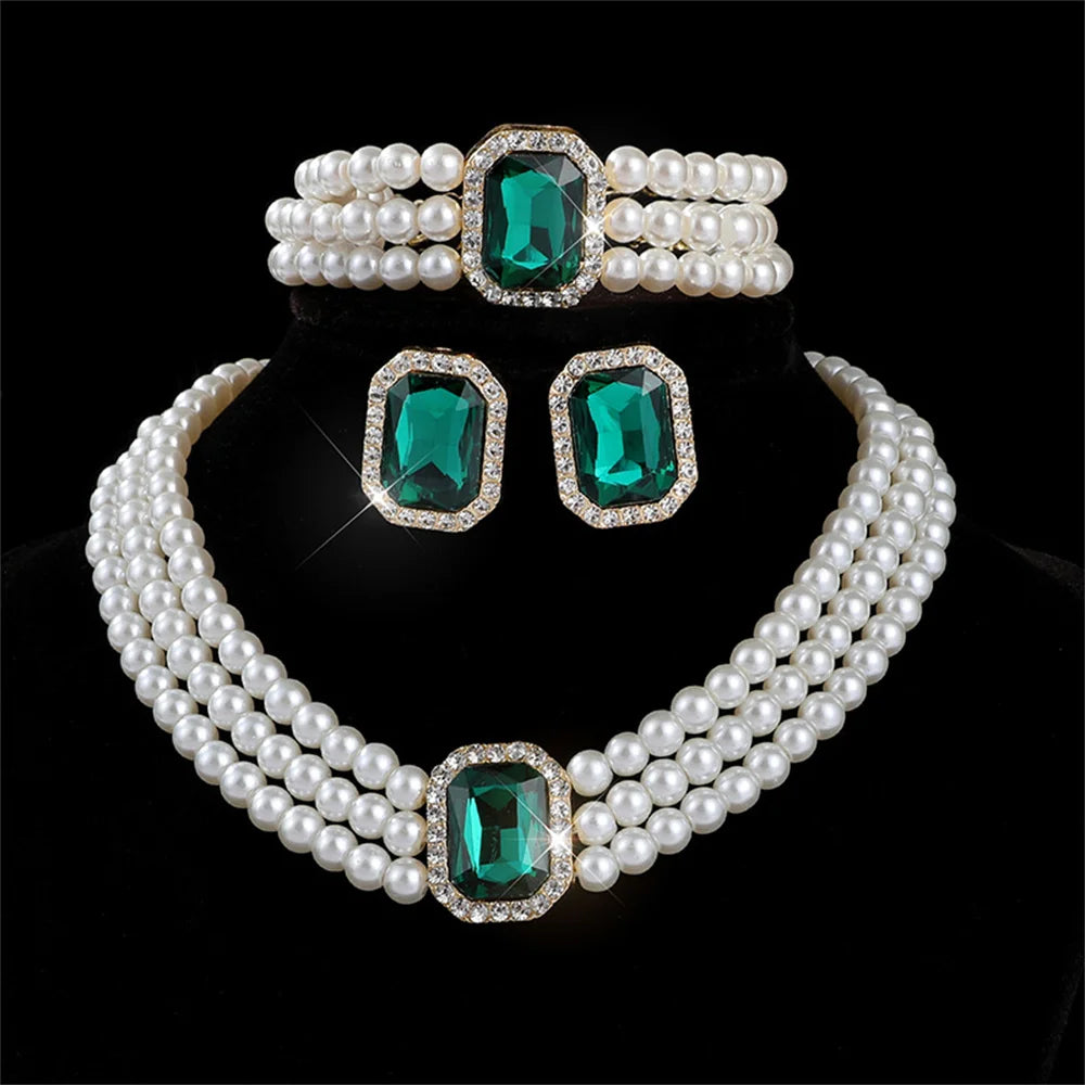 Elegant bridal jewelry set featuring versatile necklace and earring jewelry by MC THE BLACK DIAMOND on a white background.