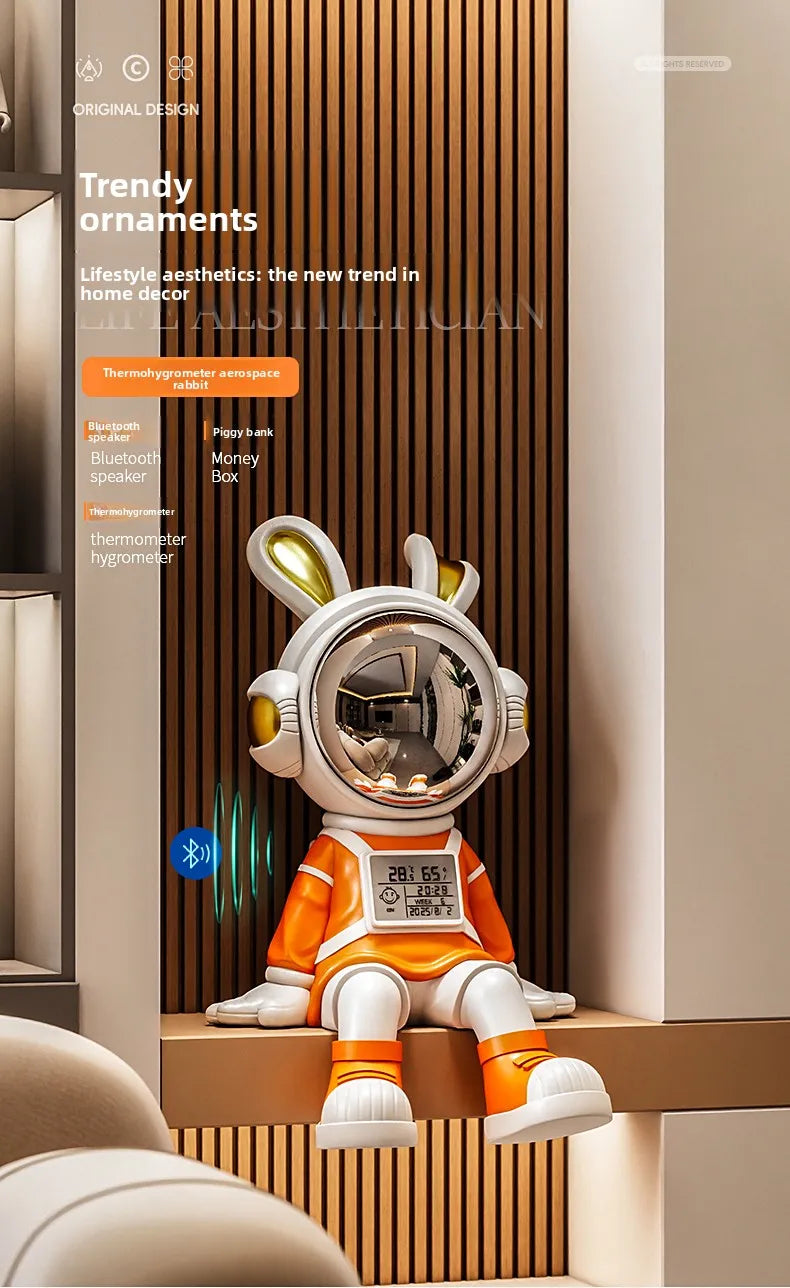 MC THE BLACK DIAMOND astronaut rabbit figurine sitting on a desk, decorative plush rabbit for luxury living room decor.