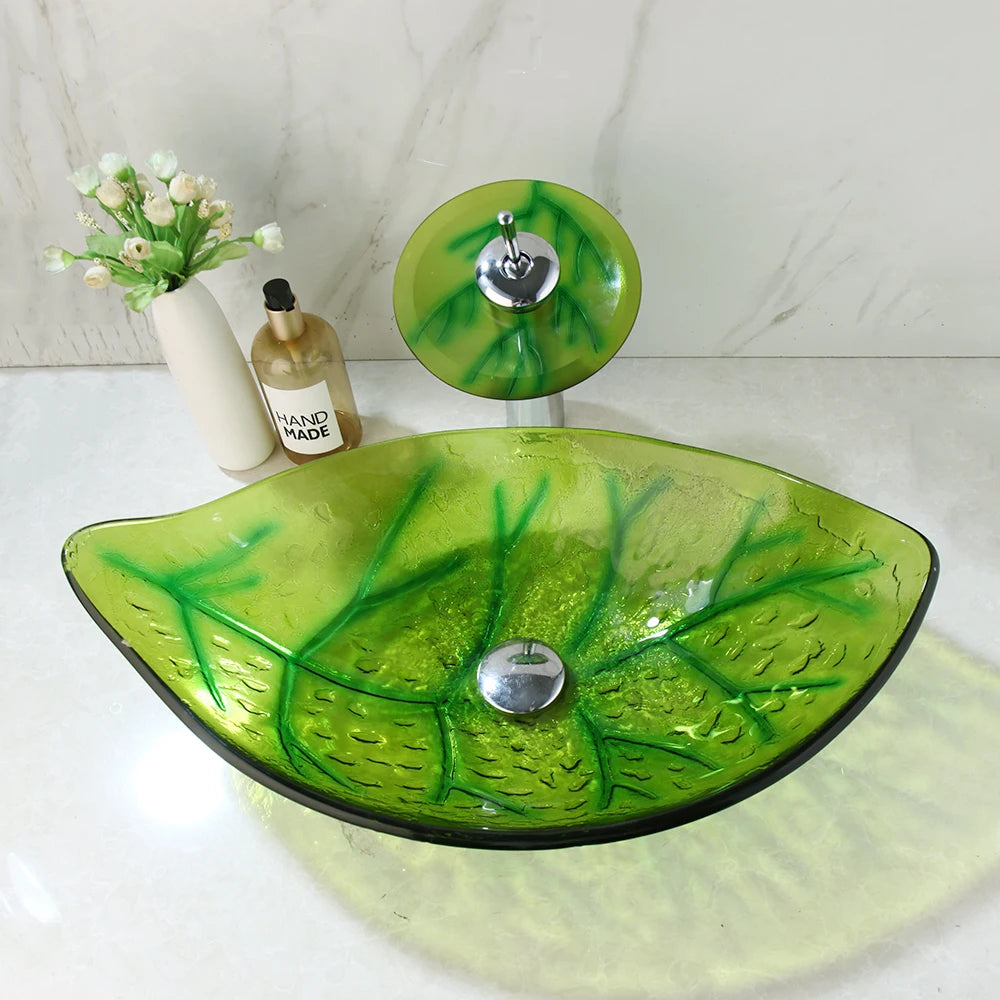 Green leaf-shaped vessel bathroom sink by MC THE BLACK DIAMOND, modern ceramic wash basin with natural leaf design.