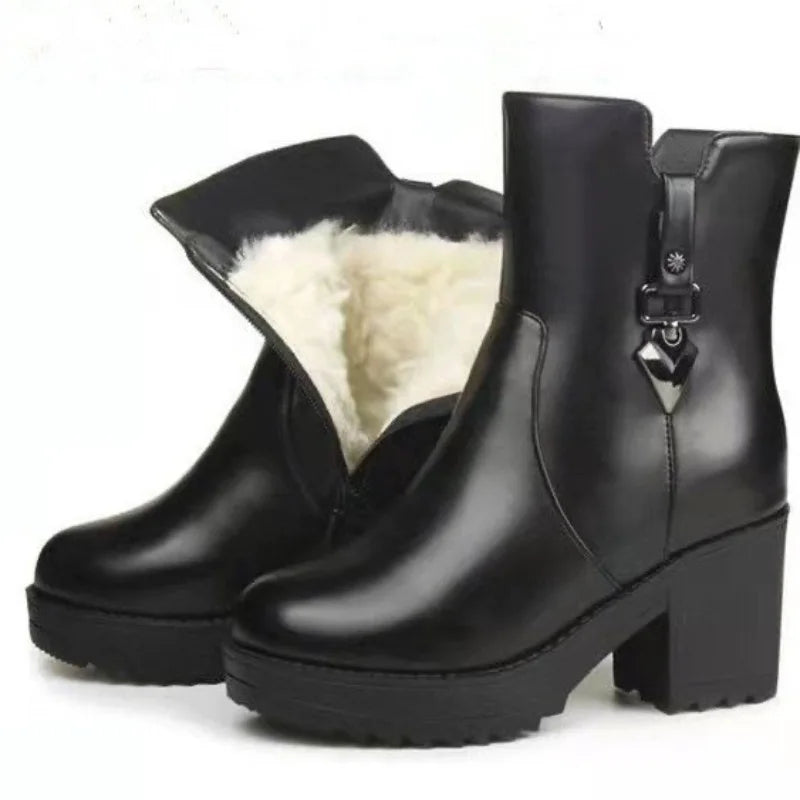 Luxury women's winter leather boots with high heels and casual style, featuring a sleek black design and fashionable silhouette.