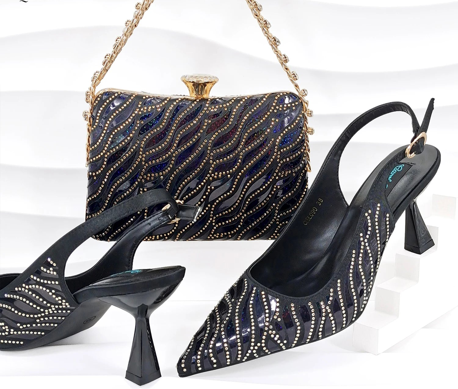 Nigerian style women’s MC THE BLACK DIAMOND heels with pointed toes and shiny clutch bag for party fashion.