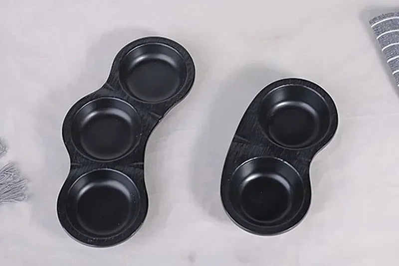 Black frosted melamine dinner plate from 𝕄𝕔 𝕋𝕙𝕖 𝔹𝕝𝕒𝕔𝕜 𝔻𝕚𝕒𝕞𝕠𝕟
