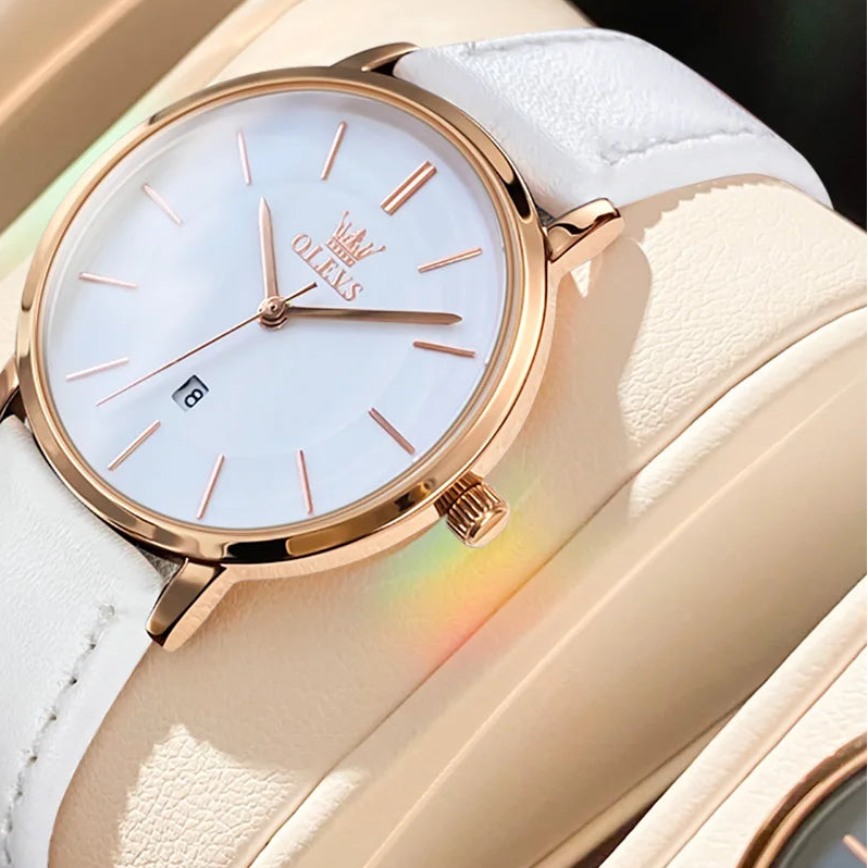 Oleves minimalist ladies' leather strap watch with waterproof quartz movement, featuring a clean dial and versatile design for women.
