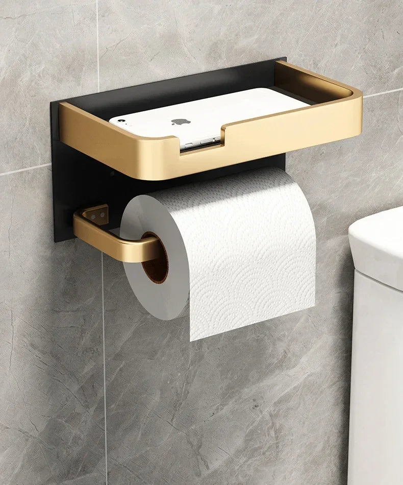 Black gold MC THE BLACK DIAMOND toilet paper holder mounted on a bathroom wall, modern bathroom accessories decor