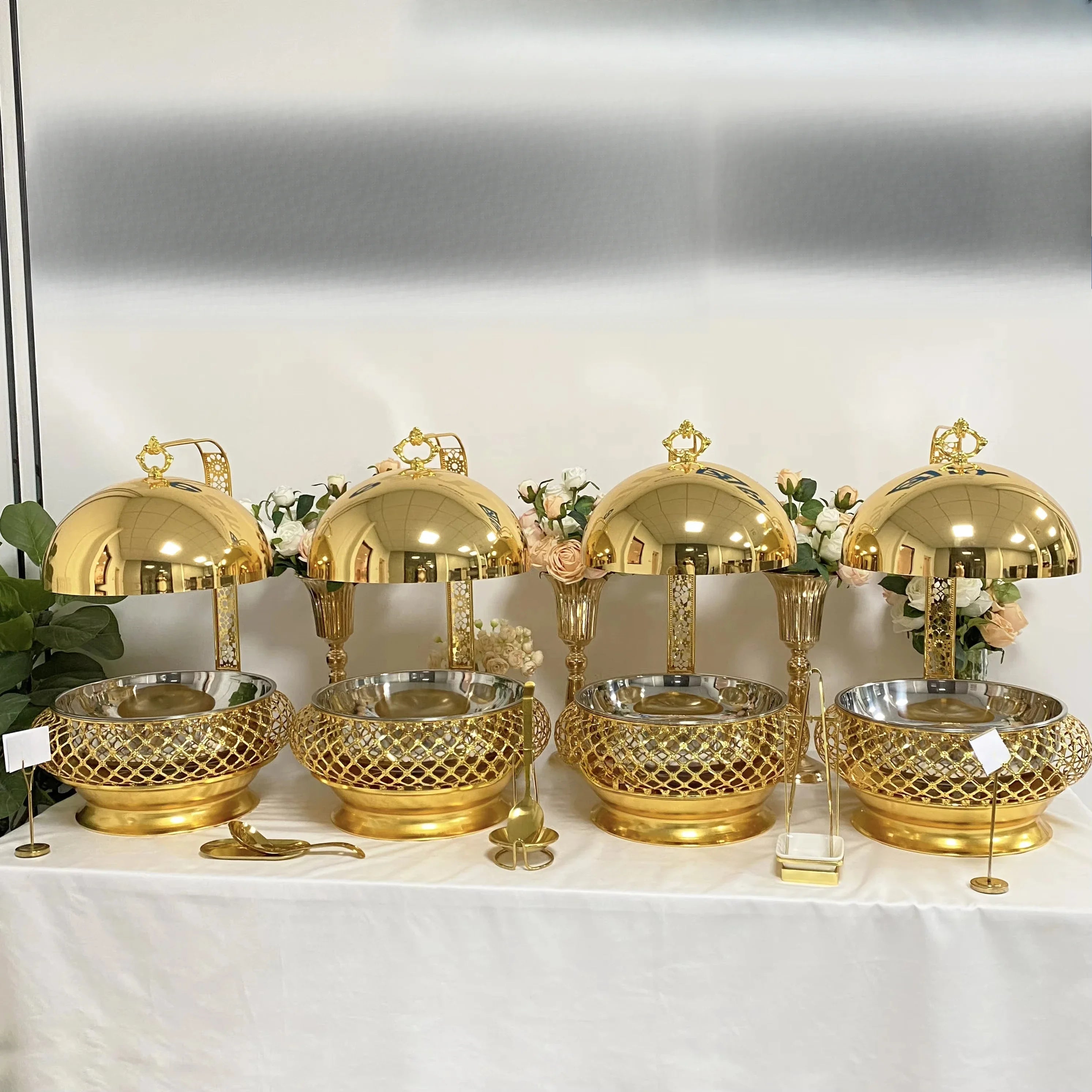 Stainless steel hanging hot pot chafing dish from MC THE BLACK DIAMOND, ideal for wedding party buffet and catering setups.