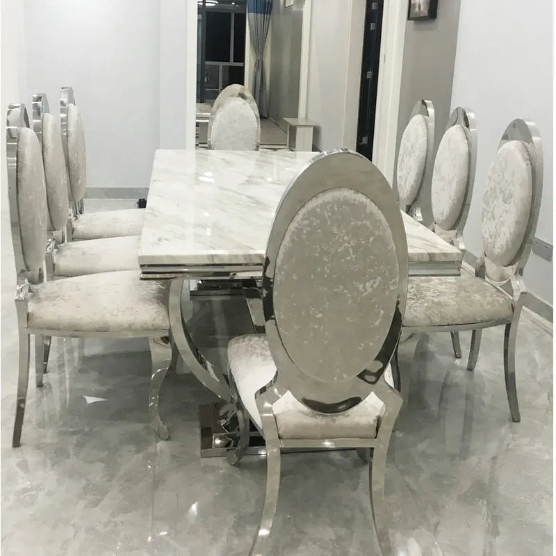 Royal Nordic Light Luxury Dining Table by MC The Black Diamonds, marble top, silver stainless steel legs, seats 4 to 8, elegant home decor.