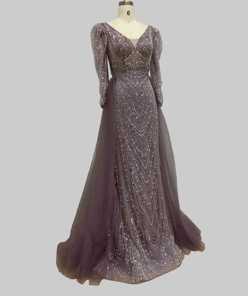 Elegant black MC THE BLACK DIAMOND long sleeve evening dress for women, showcased on a model with intricate design details.