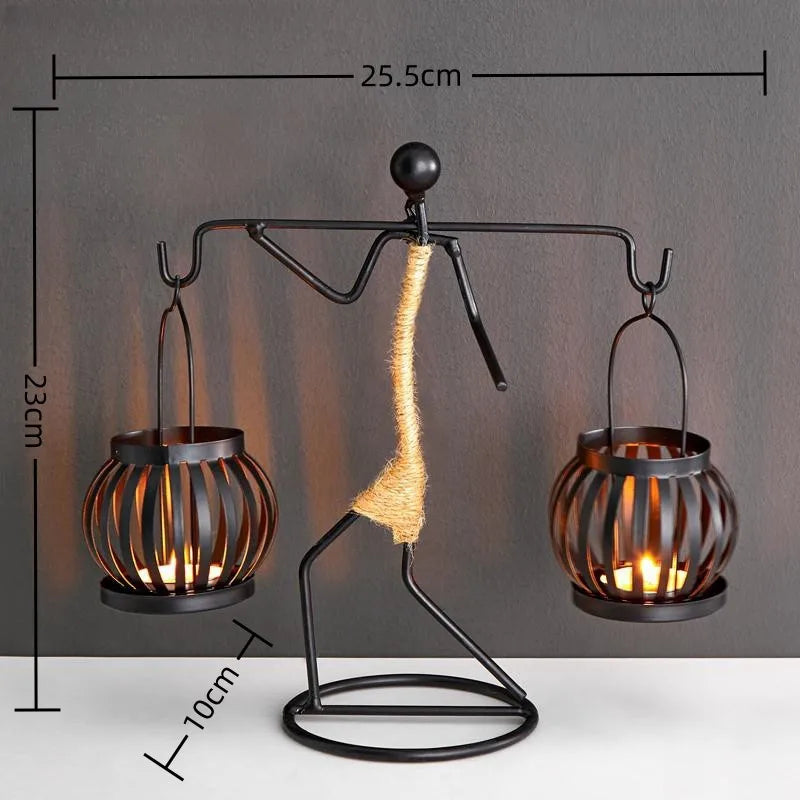 Nordic metal candle holder sculpture featuring abstract character design by 𝕄𝕔 𝕋𝕙𝕖 𝔹𝕝𝕒𝕔𝕜 𝔻𝕚𝕒𝕞𝕠