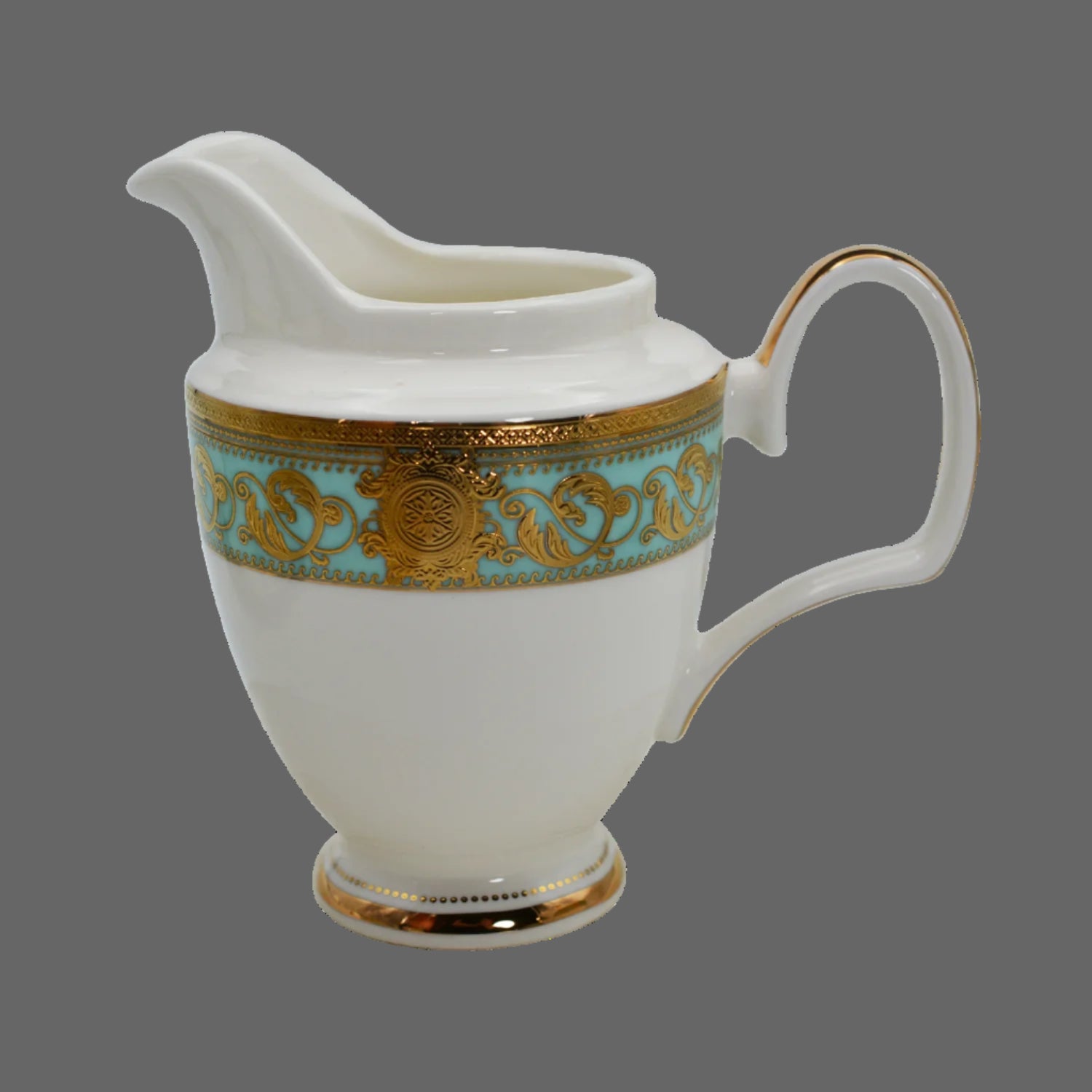 Elegant MC THE BLACK DIAMOND embossed gold porcelain dinnerware set featuring luxury bone china with intricate gold detailing.