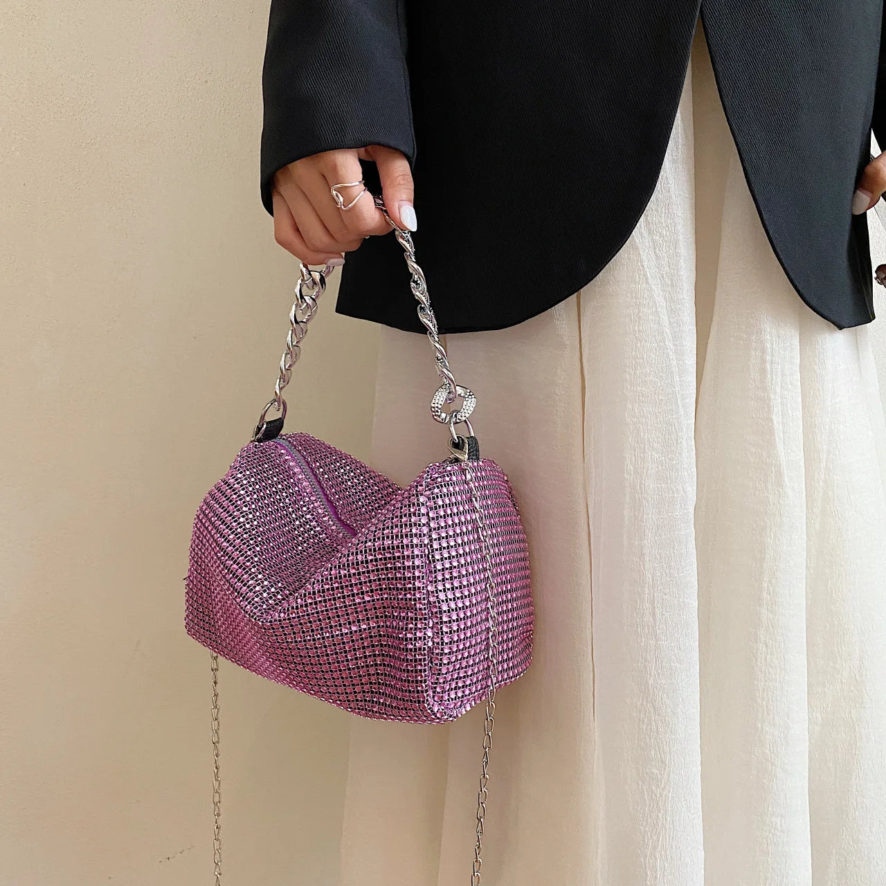 Bright diamond-patterned MC THE BLACK DIAMOND handbag, stylish messenger bag with trendy fashion design and elegant details.