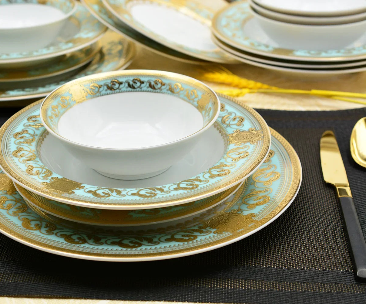 Elegant MC THE BLACK DIAMOND embossed gold porcelain dinnerware set featuring luxury bone china with intricate patterns.